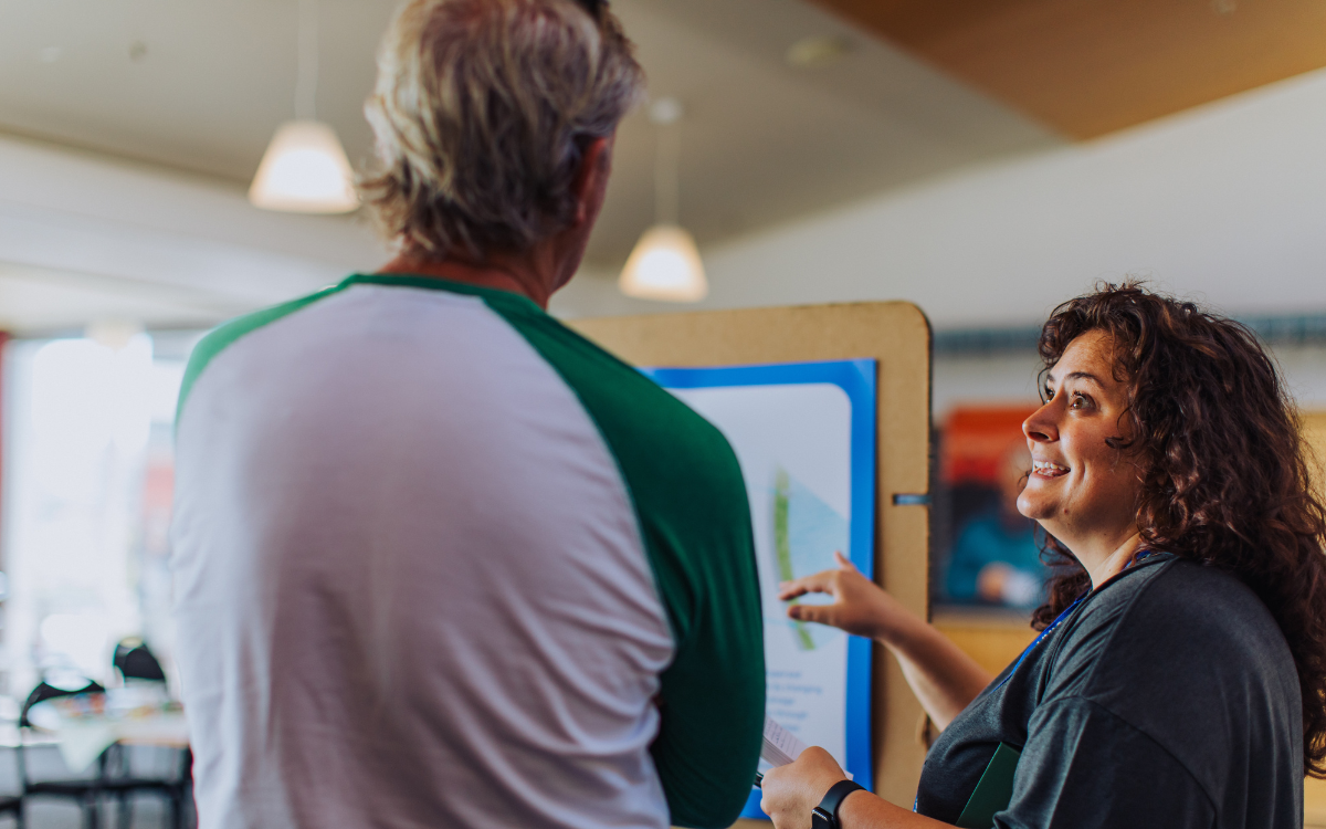 Laura Robichaux speaks to another person during an engagement