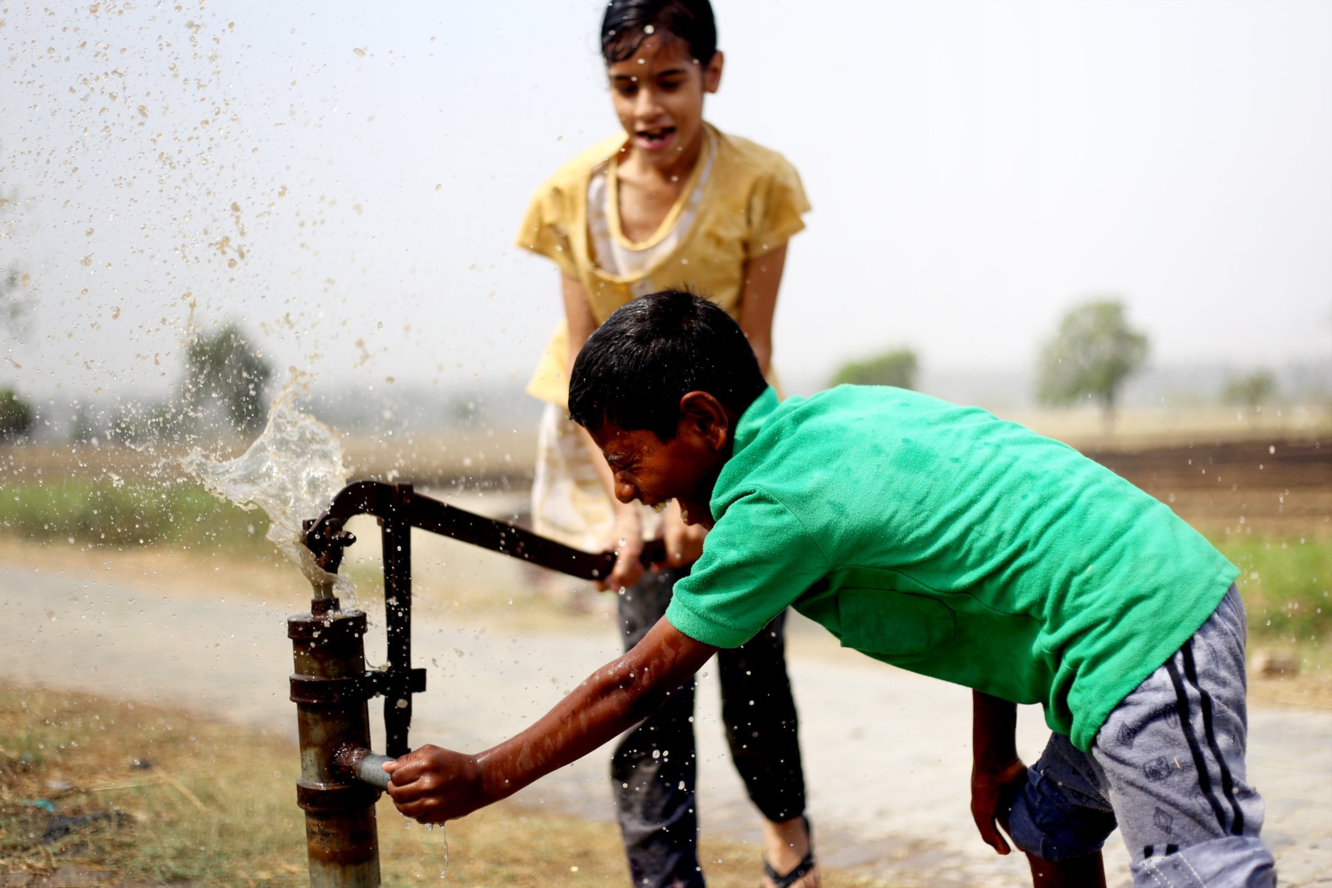 Boys playing with water